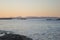 Evening look along Formentera`s coast up to a mountain range.