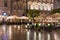 Evening at market square Krakow with empty terraces while raining