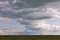 An evening at the Masai Mara National Park in Kenya. A huge sky with fantastic clouds,