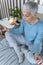 Evening Meditation for a Better Sleep. Senior Woman Meditating in Lotus Position at Home