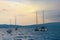 Evening Mediterranean landscape. Yachts and fishing boats on water. Montenegro