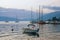 Evening Mediterranean landscape. Yachts and fishing boats on water. Montenegro, Bay of Kotor, Tivat