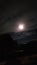 Evening moon cloudy