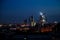 Evening or night illuminated building of Moscow City in construction on deep blue sky. Panoramic photo