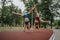 Evening Outdoor Workout: Athletic Sisters Perform Stunning 360-Degree Flips and Cartwheels in Park