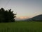 An evening over sky view with paddy crops below and A burapahar mountain
