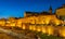 Evening panorama of defense city walls, moat and tenement houses in Starowka Old Town of Warsaw, Poland