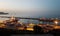 Evening panorama of the port of Skikda and the calm expanse of the Mediterranean Sea after sunset. Algeria. April 27, 2018