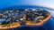 Evening panorama of the seaside resort of Gelendzhik. View of the Thick Cape and lighthouse. See the beach and the promenade