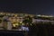 Evening photo from the rooftop garden with views of the colorful lighted hotels in Costa Adeje, Tenerife, Spain