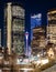 Evening photograph during the winter of a modern Canadian city with the Calgary Tower and buildings in the downtown