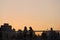 Evening picture. Silhouettes of people walking along the seafront 26 Dec 2020