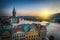 Evening in Prague. View of the roofs of houses and the river Vltava.