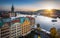 Evening in Prague. View of the roofs of houses and the river Vltava.