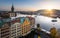 Evening in Prague. View of the roofs of houses and the river Vltava.