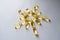 Evening primrose oil supplement capsules arranged as sun