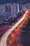 Evening road of Muscat Oman with car light trails inside the town.