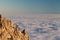 Evening rocks and sea in clouds