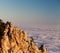 Evening rocks and sea in clouds