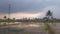 The evening sky over the vast expanse of rice fields