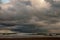 Evening sky scape with storm at sea