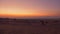 Evening sky and twilight in beautiful sky above sand dunes in wild desert