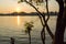 Evening sun over a Burmese fishing village - Horizontal