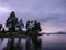 Evening sunset purple grey colors lake landscape in Sweden camping site