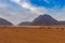 Evening time near mountains at Sinai Desert, Sharm el Sheikh, Sinai Peninsula, Egypt. ATV quad safari on the sand