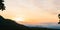 Evening time of panorama mountain under dramatic twilight sky and cloud. Nightfall Silhouette mountain on sunset