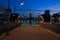 Evening trains stands on platform of city station