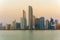 Evening view of Abu Dhabi financial district skyline. Luxury lifestyle hotels and business of United Arab Emirates.