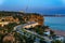 Evening view of Antalya coastline with road, beach and coastal cliffs