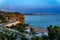 Evening view of Antalya coastline with road, beach and coastal cliffs