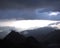 Evening view of blue mountain ranges in the haze. clouds