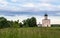 Evening view through Bogolubovo meadow towards the Church of the Intercession of the Holy Virgin on the Nerl River.