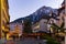 Evening view of Brig-Glis street with Christmas tree on background of Alpine peaks