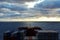 Evening view on deck of container ship, during her passage through the ocean.