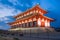 Evening view of The Great Hall of State of Heijo Palace in Nara, Japan Sign says `Daigokuden` meaning `The Great Hall of State`