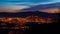 Evening view of illuminated Liberec city and Jested Mountain. Night scene