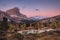 Evening view of the lake Limides and mount Tofana di Rozes