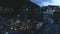 Evening view of Manarola town, panorama of illuminated buildings, Cinque Terre