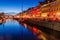 Evening view of Nyhavn district in Copenhagen, Denma