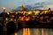Evening view of Prazsky Hrad and bridge over Vltava river in Prague