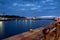 Evening view of quay, harbor and swing bridge at mouth of Slupia at baltic sea. Ustka, Poland