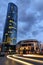 Evening view of Sky Tower office building with light auto trails