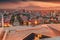 evening view from the stairs of Cascade monument to the colorful sunset over rooftops of Yerevan city and symbol of Armenia