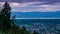 Evening view from the top of the French town Bons-en-Chablais, lake Genevalake Leman and the mountains in Switzerland.