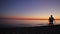 Evening walk of lovers along the beach.