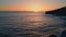 Evening waves washing stones drone view. Sky horizon over stormy ocean water